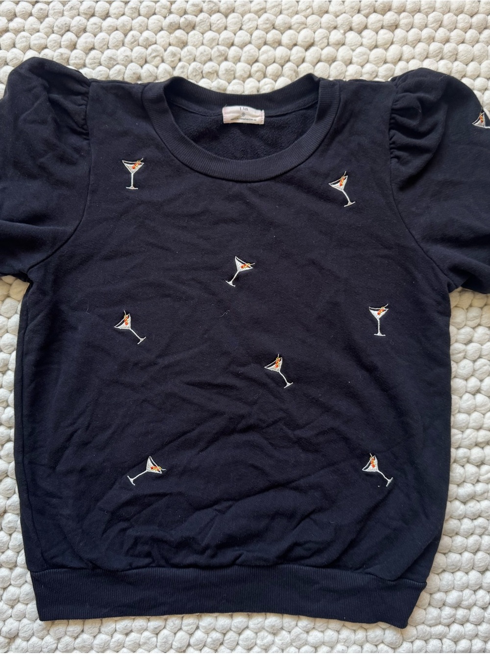 Anthropologie — T.La Black Puff-Sleeve Tee with Martini Embroidery